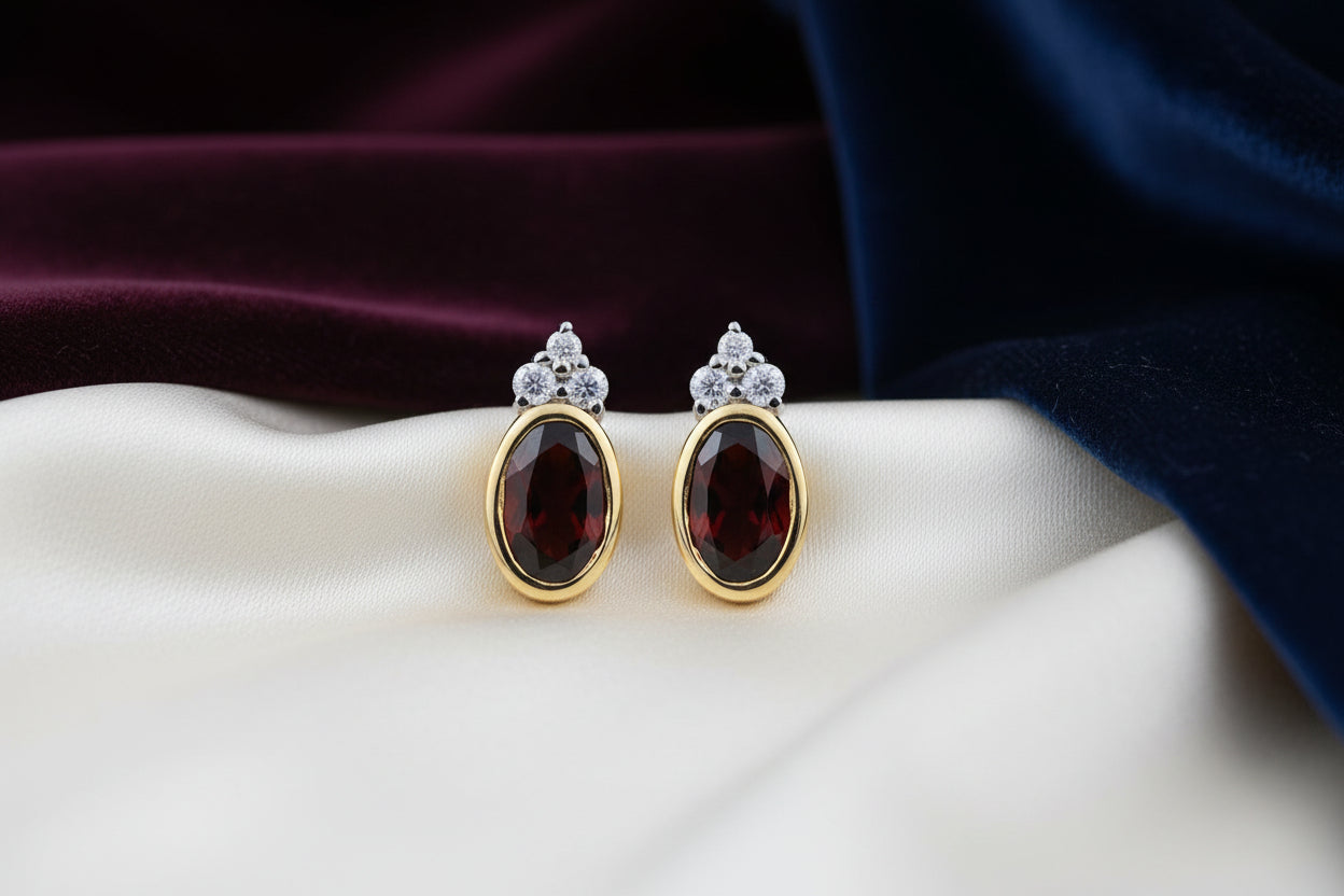 10K YG 5X3MM GARNET & .04CTW DIAMOND STUDS