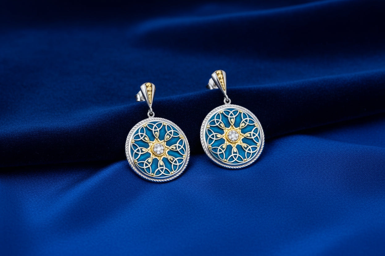 KEITH JACK SS 10K YG TRINITY KNOT SHIELD WITH SKY BLUE ENAMEL AND CZ EARRINGS