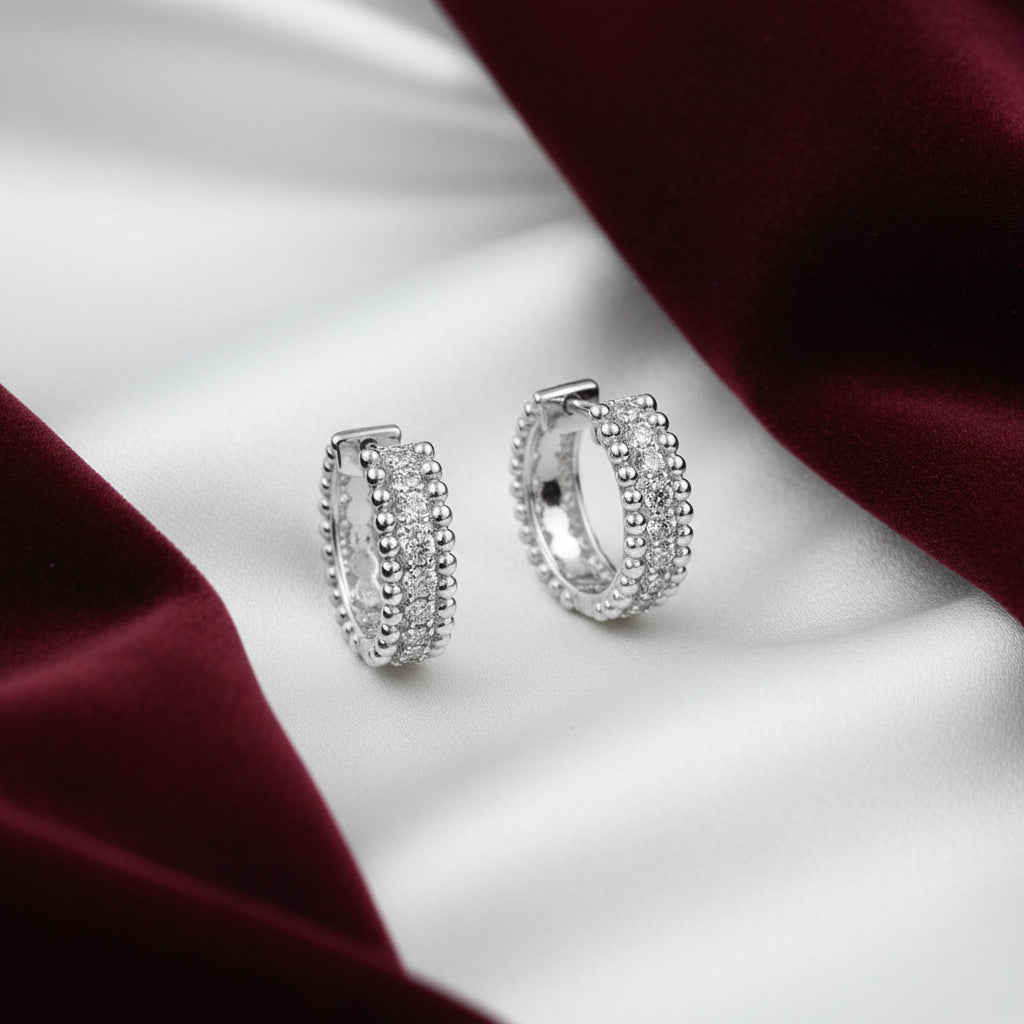 (S2203381) Sterling Silver 0.21ctw White Sapphire Bujukan Huggies "Gabriel & Co"