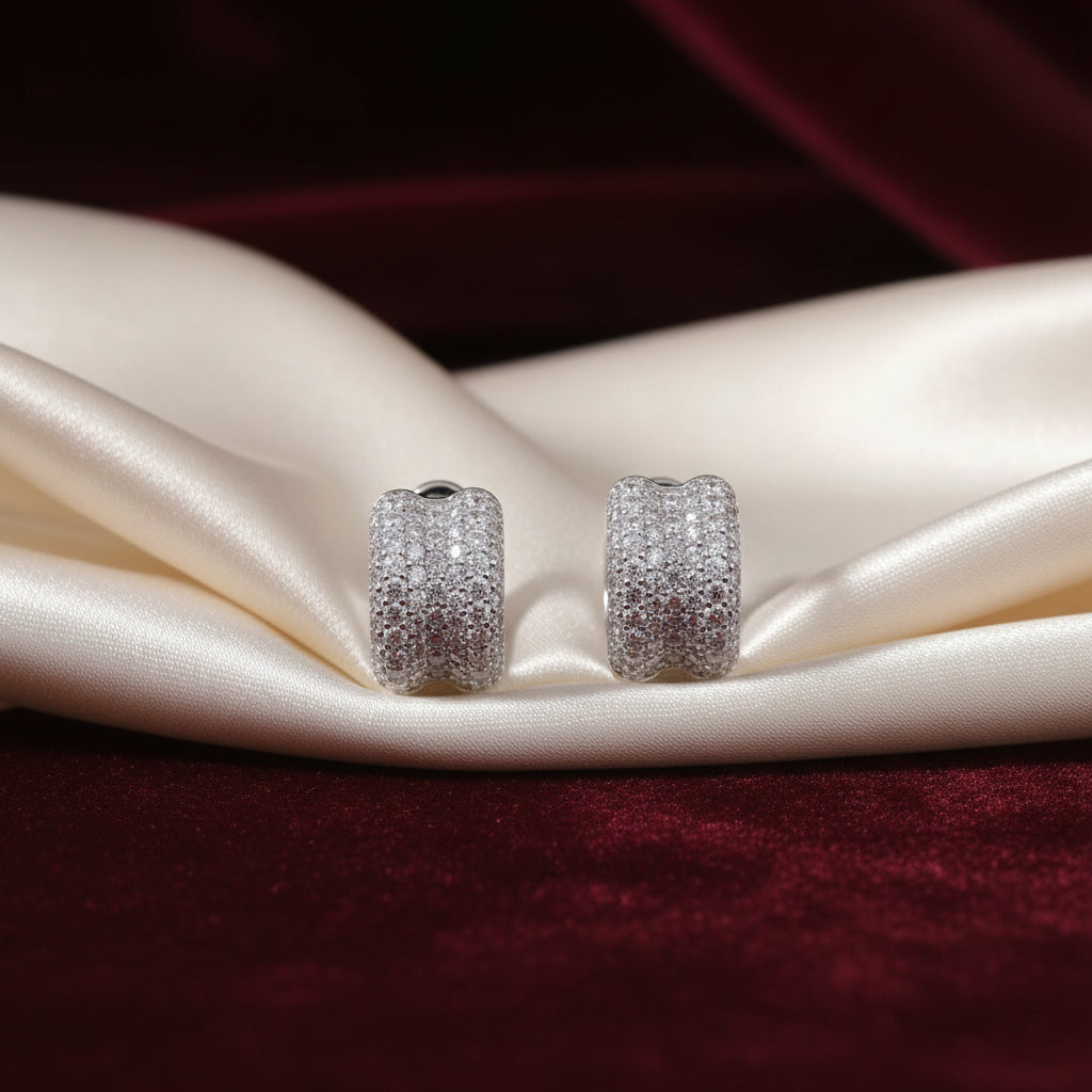Sterling Silver Medium Hug Huggies Accented with Cubic Zirconia