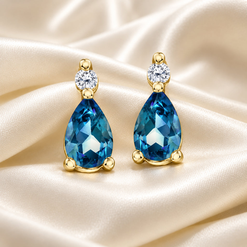 10K Yellow gold pear shaped London Blue Topaz and Diamond earrings