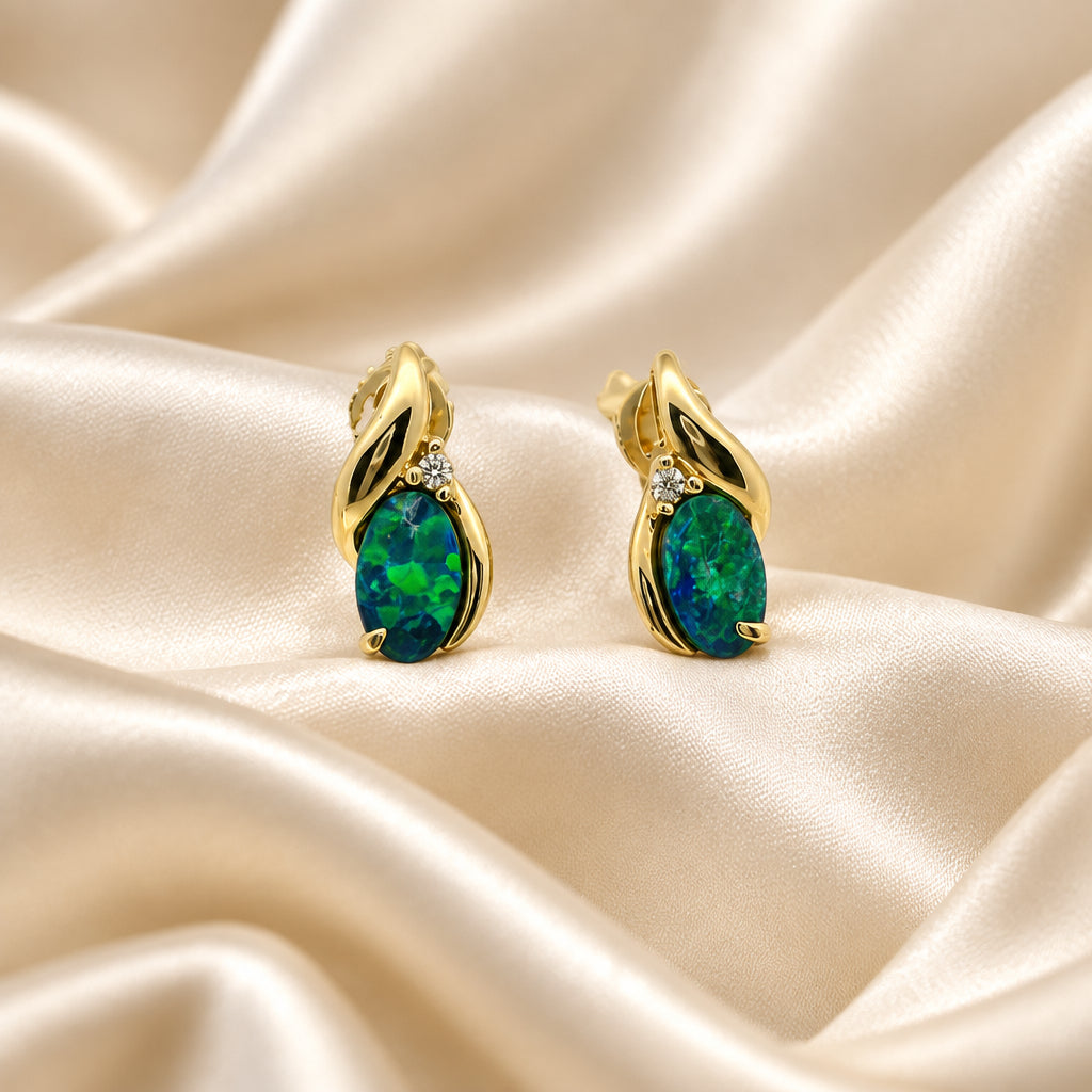 10K Yellow gold oval Australian Opal doublet and Diamond bypass earrings
