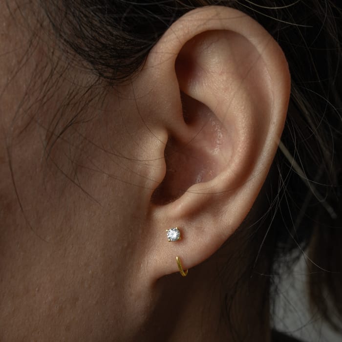 10K Yellow gold cubic zirconia open curve stud earrings