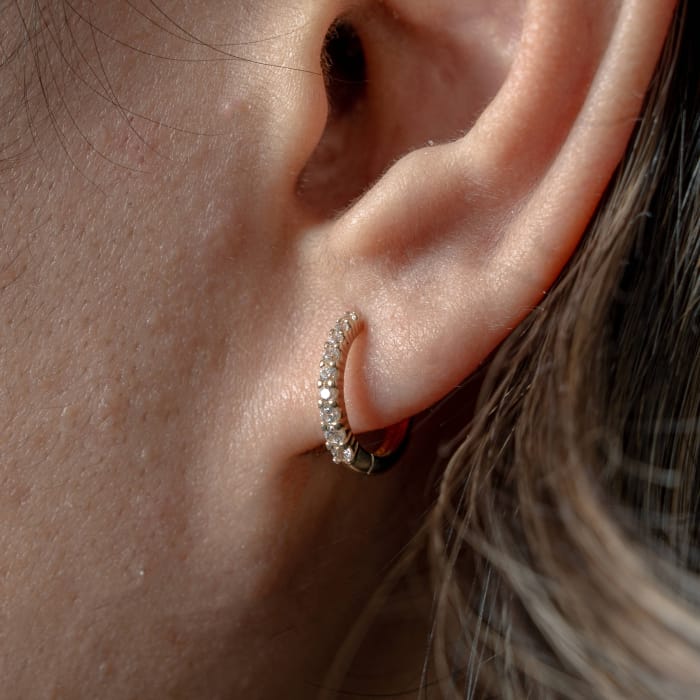 10K Yellow gold cubic zirconia pave huggie earrings