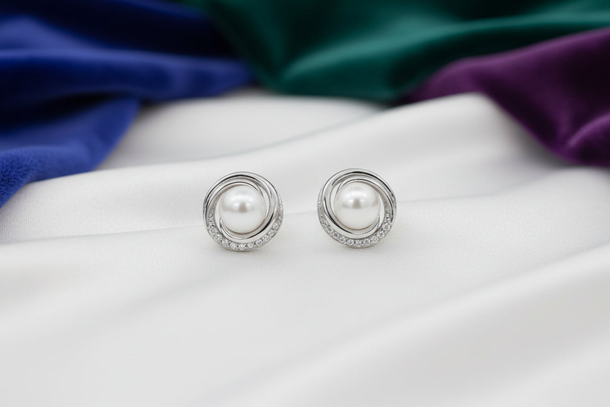 Sterling Silver Rhd CZ & Mother of Pearl Knot Studs