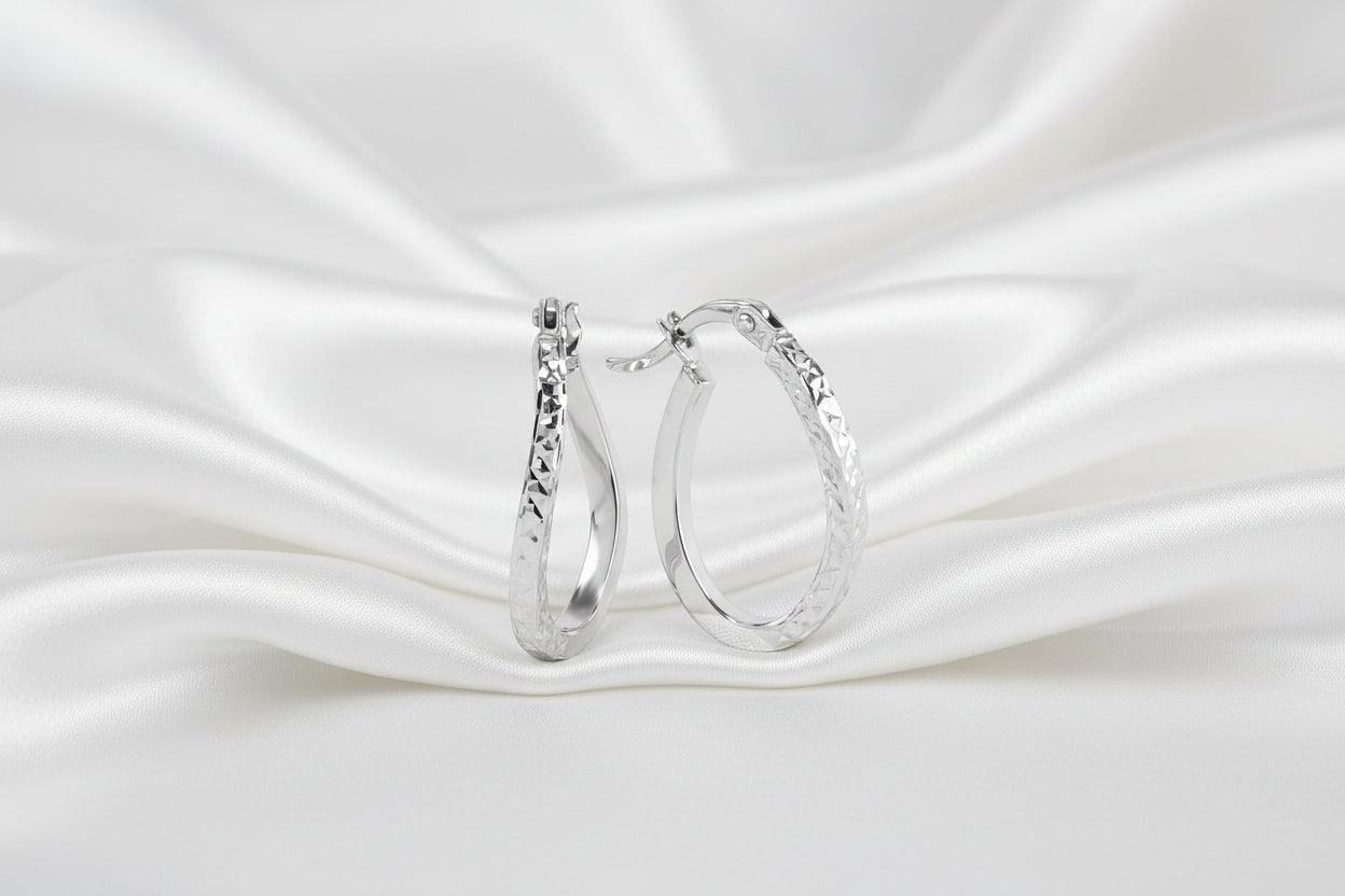 10K WG Oval Diamond Cut Hoops