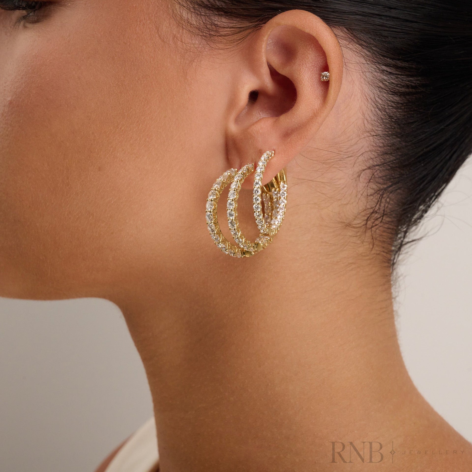 In & Out Huggie with secure lock Lab Grown Diamond Earrings