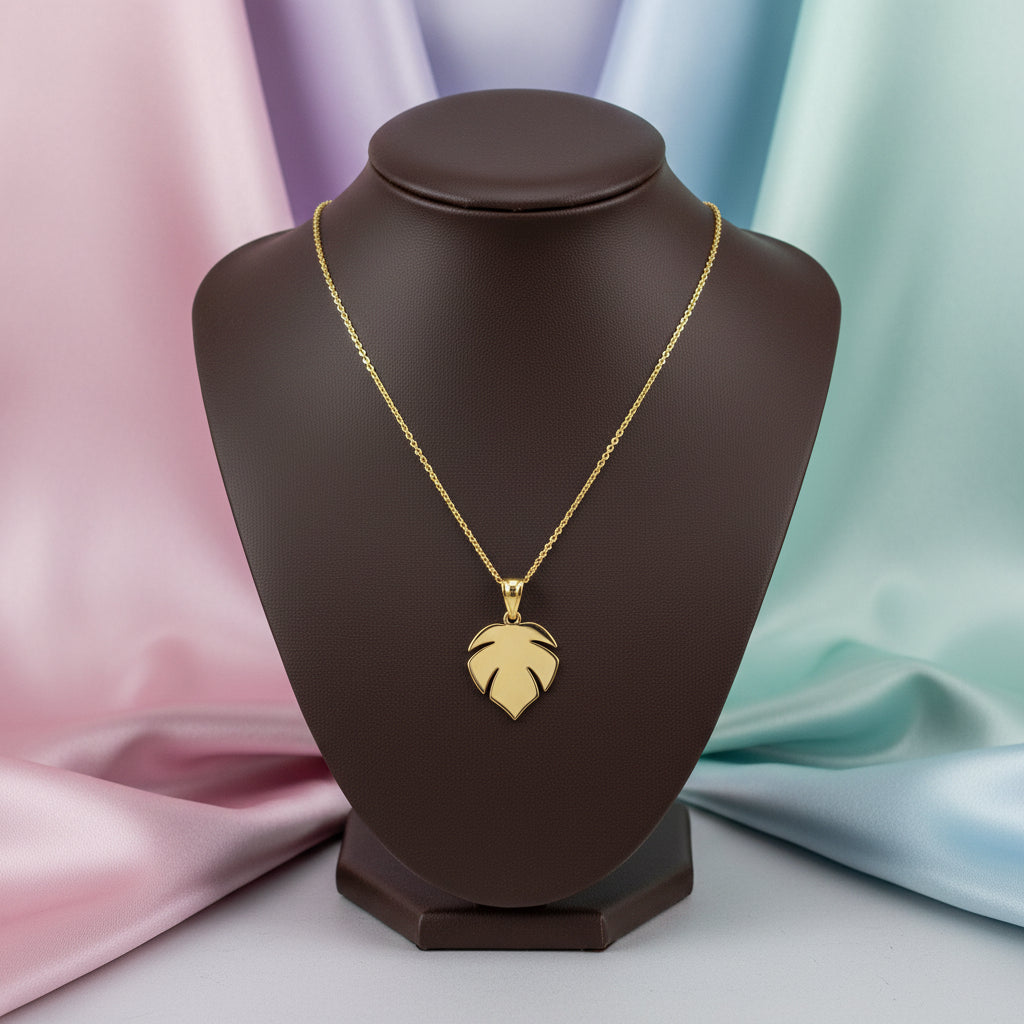 10K Yellow gold tropical leaf pendant
