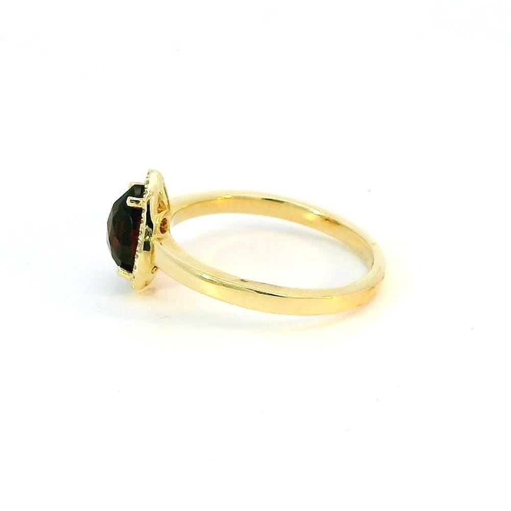 Pear Shape Garnet & Diamond Halo Ring